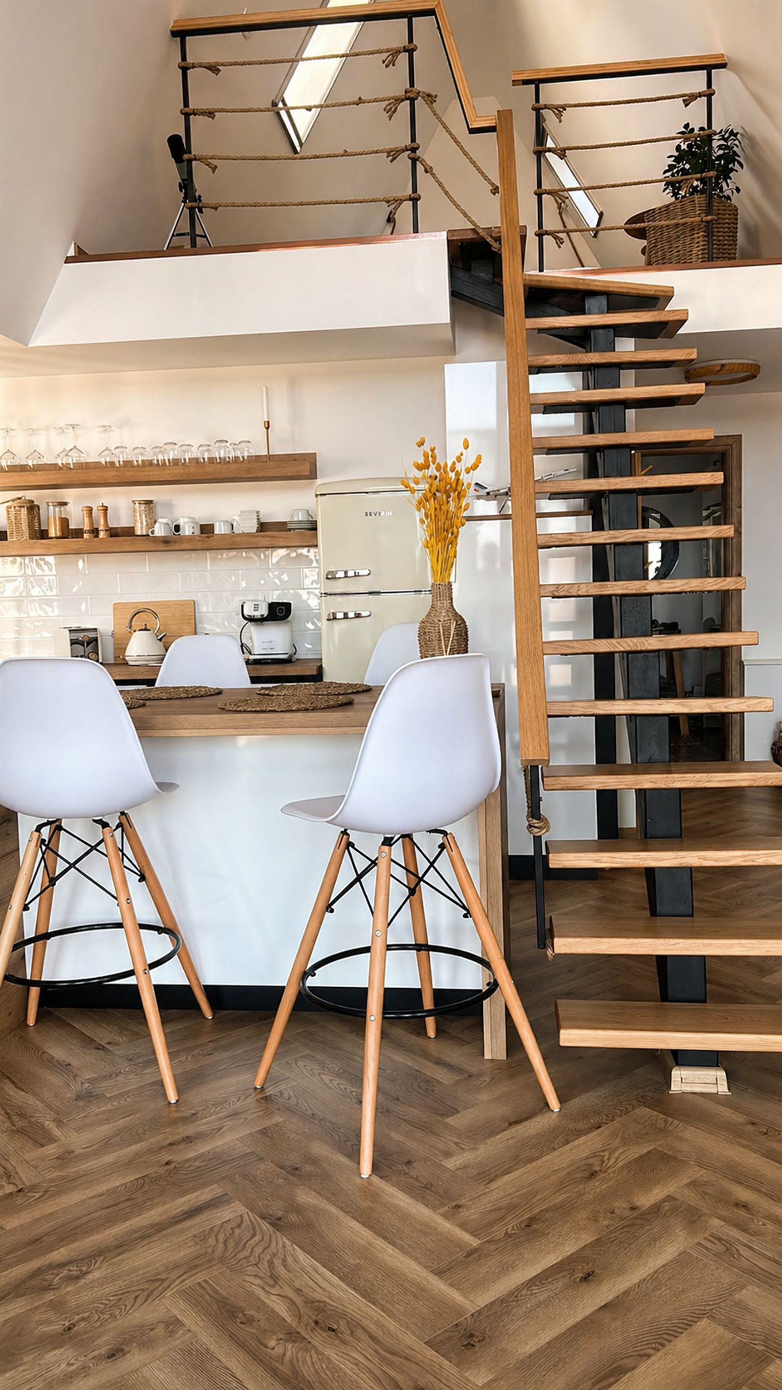 Kitchen island with bar stools and stairs